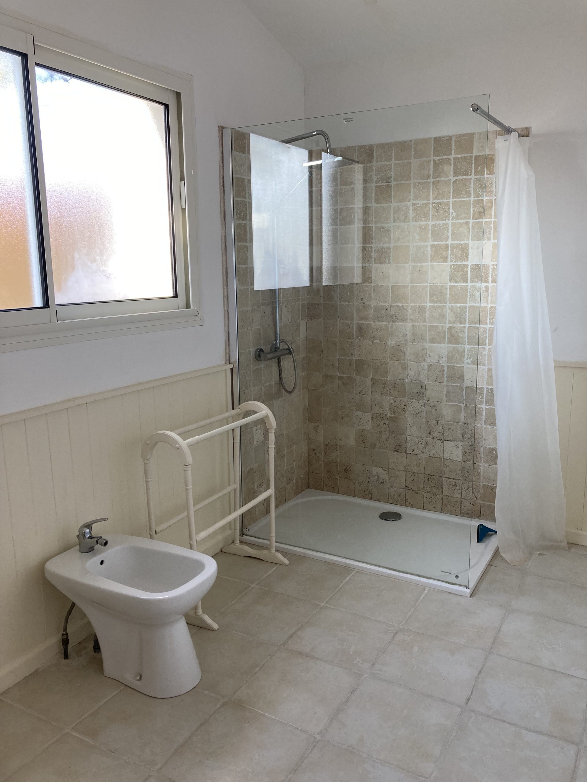 Large bathroom with walk-in shower